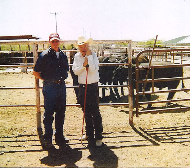 Neil with colleague near farm