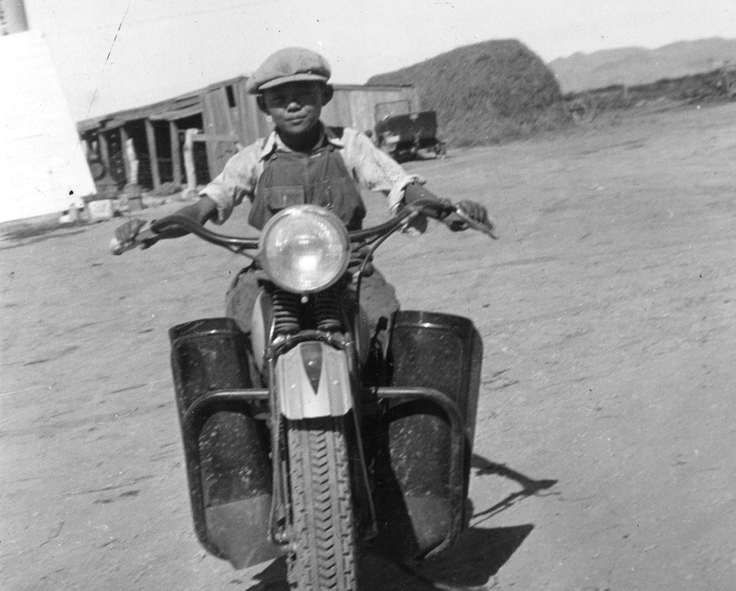 Roy as a young child on a bike